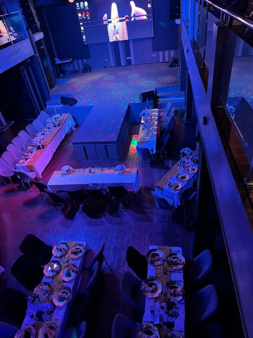 The room from the balcony, dressed for a seated event